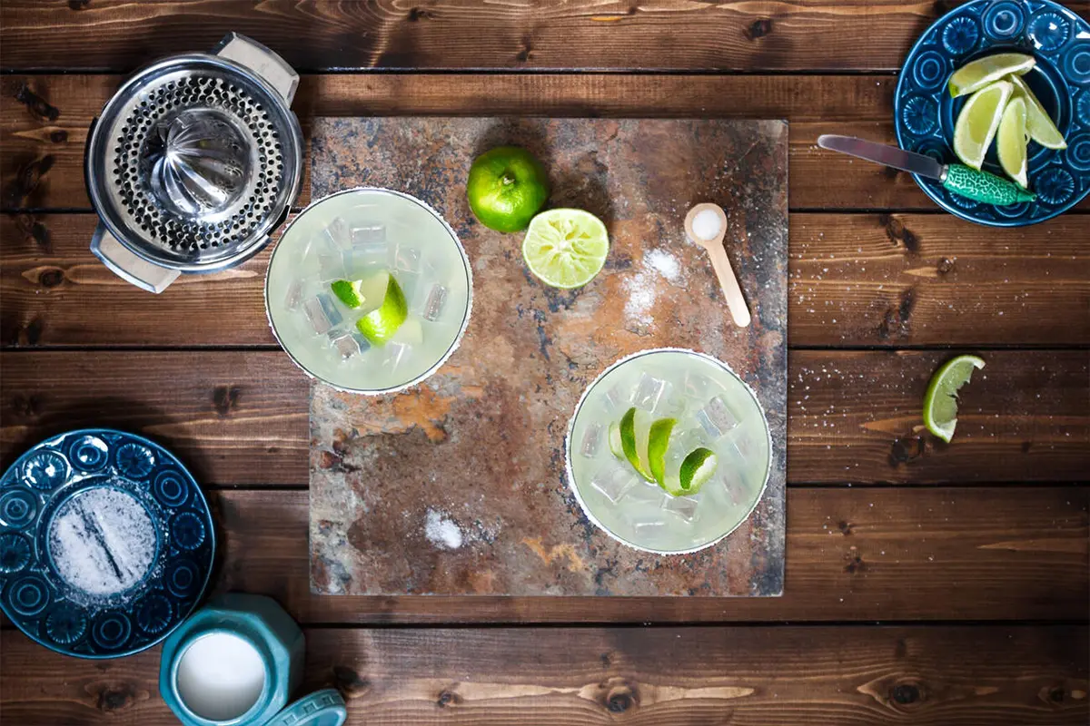 Ingredients and tools for making a classic Margarita