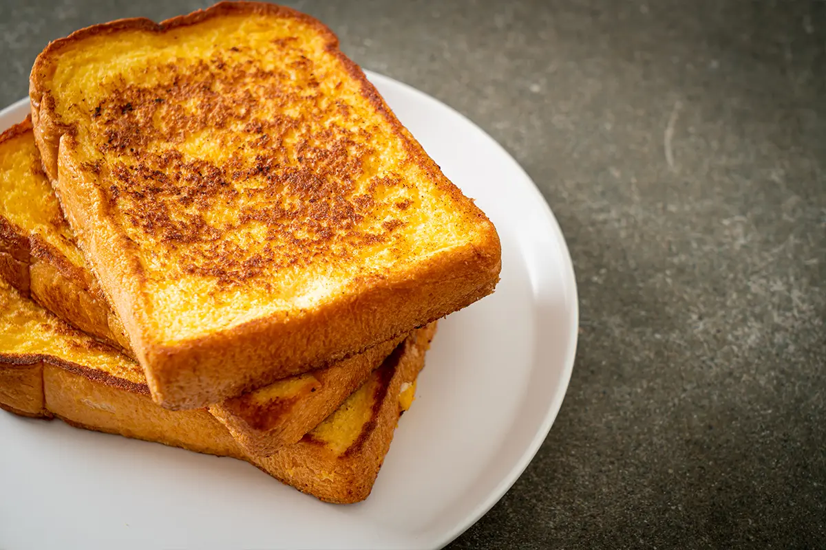 Professional chef making French toast