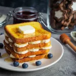 Elegant French toast breakfast setup with toppings