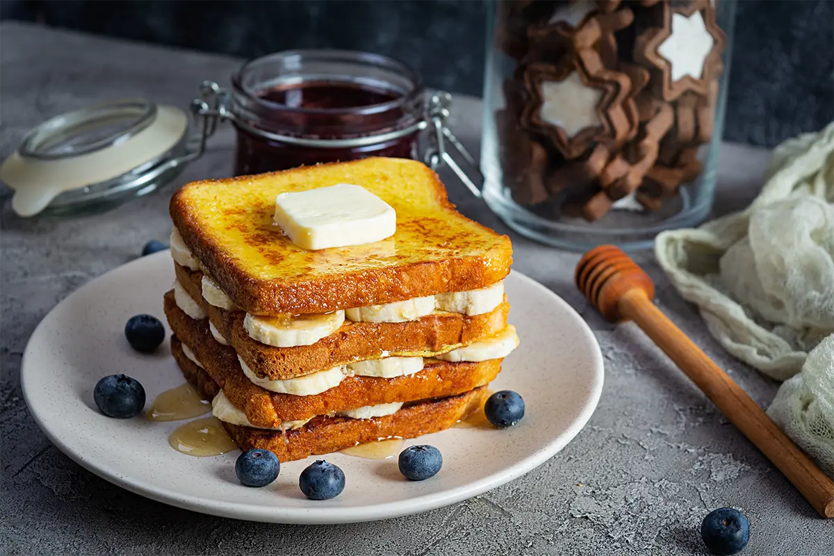 Elegant French toast breakfast setup with toppings